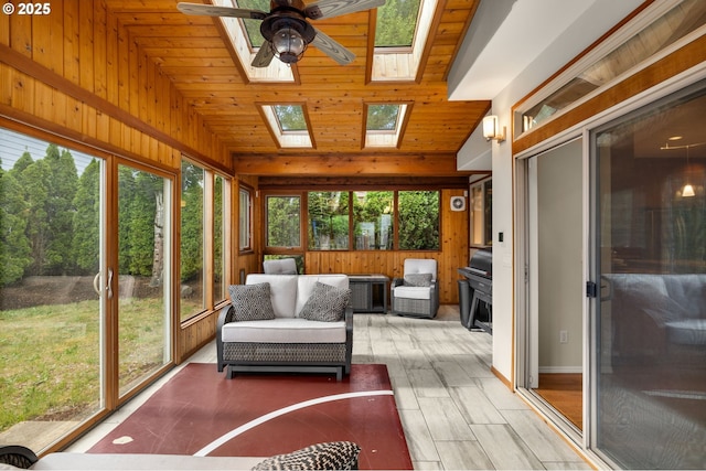 22767 SW Saunders Dr, Sherwood, OR 97140 - sunroom with lofted ceiling, ceiling fan, a skylight, and an outdoor living space