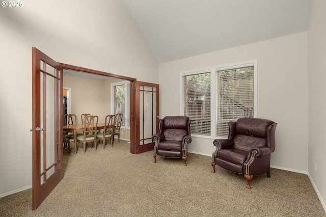 22767 SW Saunders Dr, Sherwood, OR 97140 - sitting room with carpet flooring, french doors, high vaulted ceiling, and baseboards