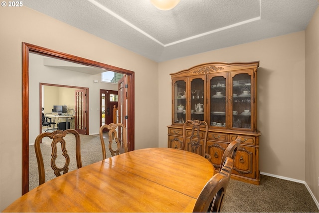 22767 SW Saunders Dr, Sherwood, OR 97140 - dining space featuring carpet, a textured ceiling, baseboards, and french doors
