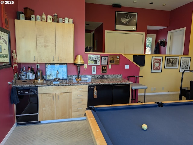 playroom with light colored carpet, pool table, a sink, baseboards, and bar area