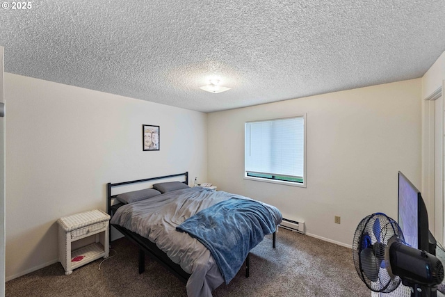 1030 Augustine Ave, Coos Bay, OR 97420 - bedroom featuring a textured ceiling, carpet flooring, and a baseboard heating unit