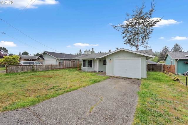 1030 Augustine Ave, Coos Bay, OR 97420 - single story home with a front lawn, aphalt driveway, a garage, and fence