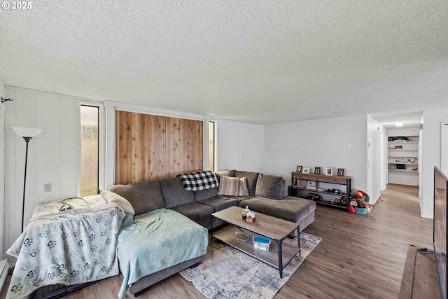 1030 Augustine Ave, Coos Bay, OR 97420 - living room featuring a textured ceiling and wood finished floors