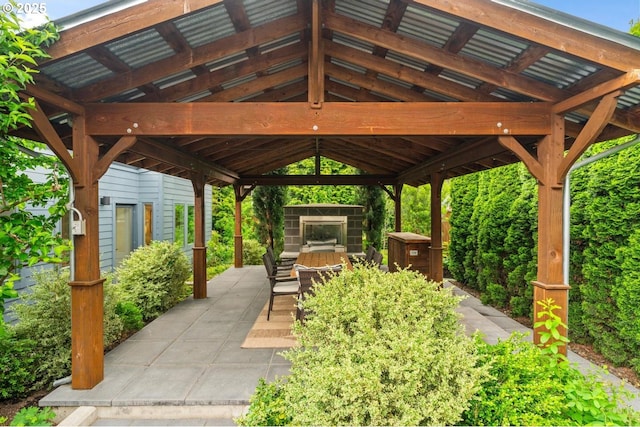 view of home's community with a gazebo and a patio