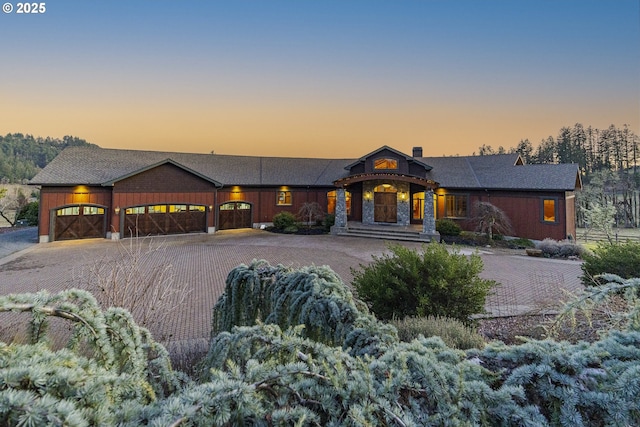 view of front of house featuring a garage and driveway