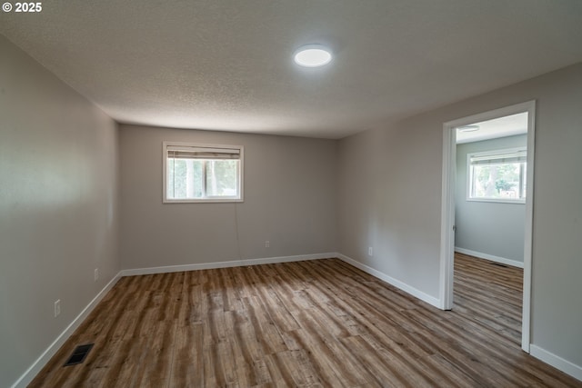 14424 SE Bevington Ct, Milwaukie, OR 97267 - unfurnished room featuring wood finished floors