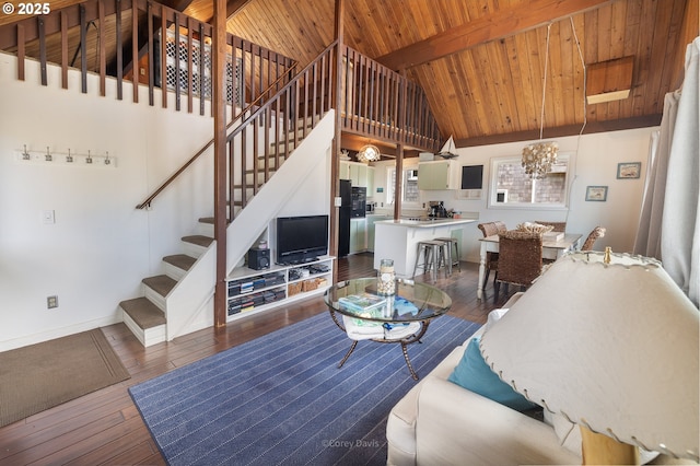33565 Shore Dr, Pacific City, OR 97135 - living room featuring wood ceiling, stairway, dark wood-style floors, a chandelier, and baseboards