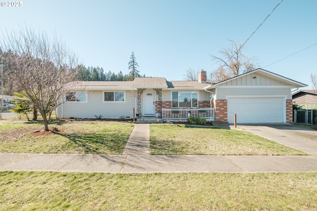 ranch-style house featuring brick siding, a chimney, concrete driveway, an attached garage, and a front lawn