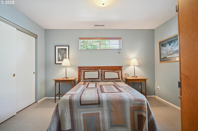 4701 NE 77th Ave, Vancouver, WA 98662 - bedroom with carpet floors, a closet, and baseboards