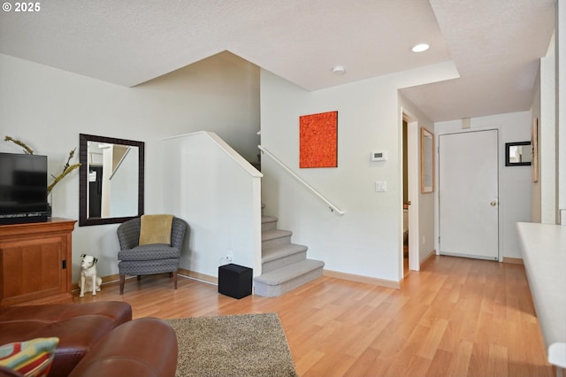 4701 NE 77th Ave, Vancouver, WA 98662 - living area featuring light wood-style floors, baseboards, stairs, and recessed lighting