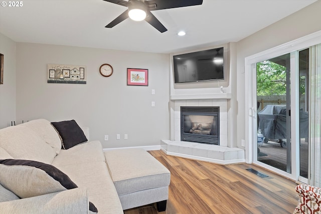 14644 SE Sterling Ct, Clackamas, OR 97015 - living room featuring wood finished floors, ceiling fan, recessed lighting, baseboards, and a fireplace