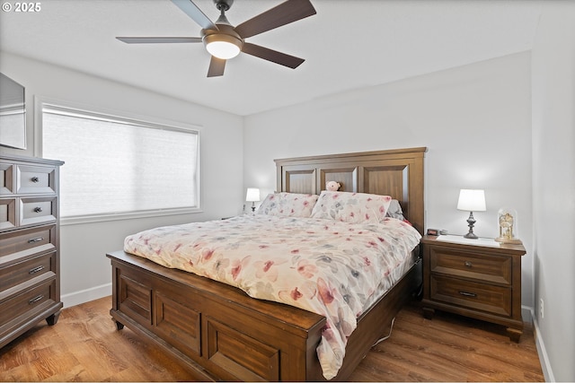 14644 SE Sterling Ct, Clackamas, OR 97015 - bedroom with light wood-style floors, baseboards, and a ceiling fan