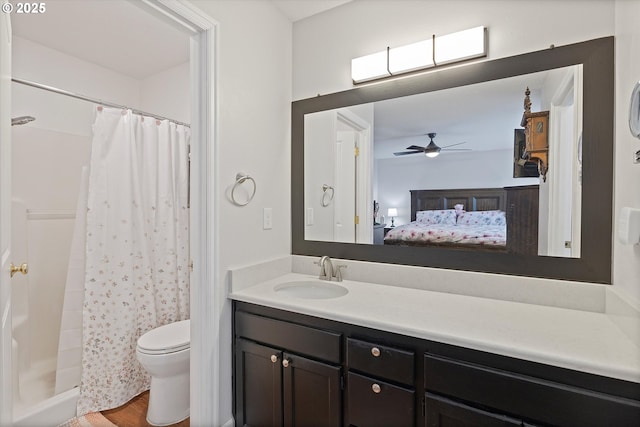 14644 SE Sterling Ct, Clackamas, OR 97015 - bathroom featuring vanity, toilet, connected bathroom, a ceiling fan, and a shower with curtain