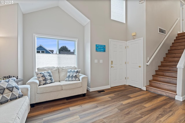 14644 SE Sterling Ct, Clackamas, OR 97015 - foyer featuring a high ceiling, stairway, wood finished floors, and baseboards