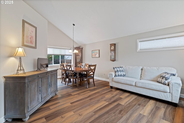 14644 SE Sterling Ct, Clackamas, OR 97015 - living area with dark wood-style flooring, vaulted ceiling, and baseboards