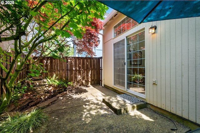 view of patio / terrace featuring fence