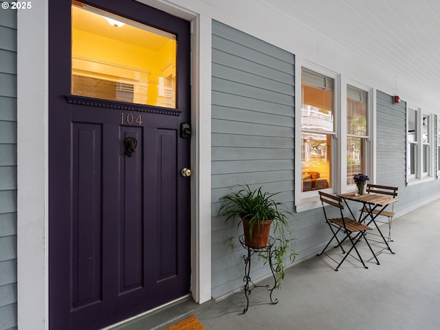 2127 NW Irving St Unit 104, Portland, OR 97210 - entrance to property featuring covered porch