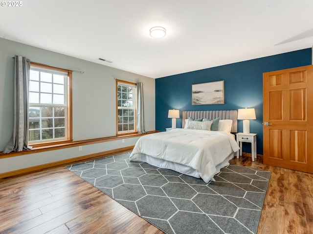 bedroom featuring hardwood / wood-style floors