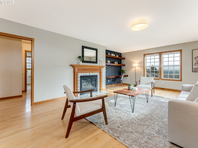 living room with light hardwood / wood-style flooring