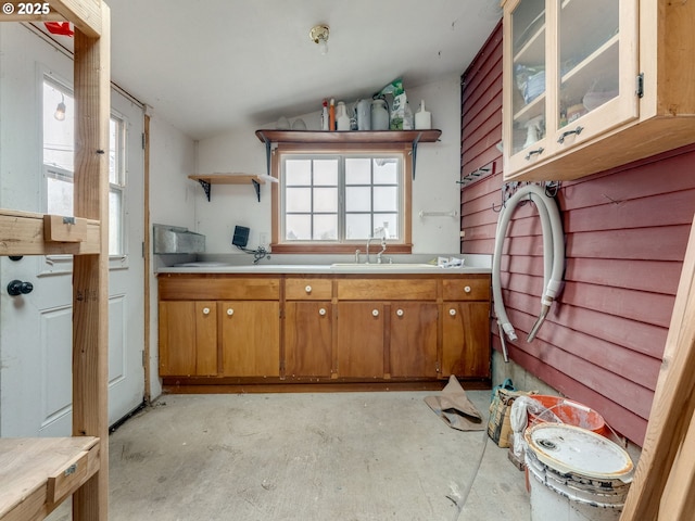 kitchen featuring sink and vaulted ceiling