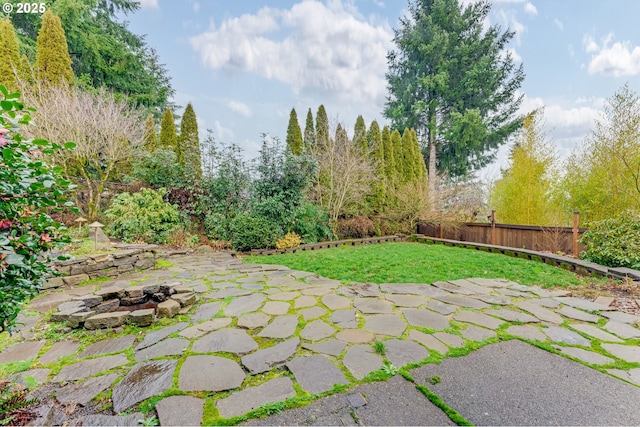 view of patio / terrace featuring a fire pit