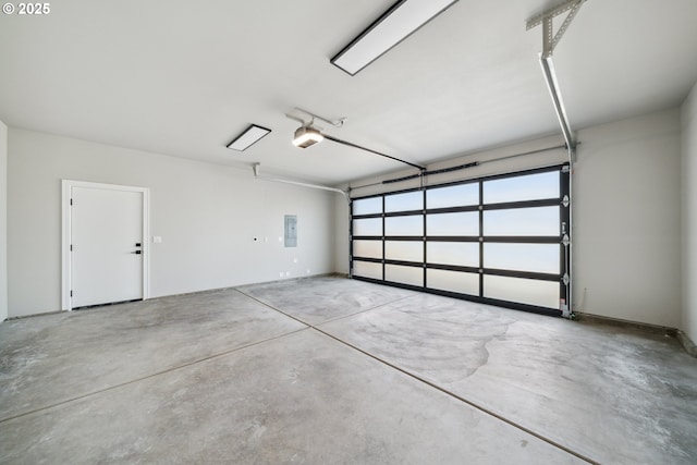559 Meadows Dr, Manzanita, OR 97130 - garage with electric panel and a garage door opener