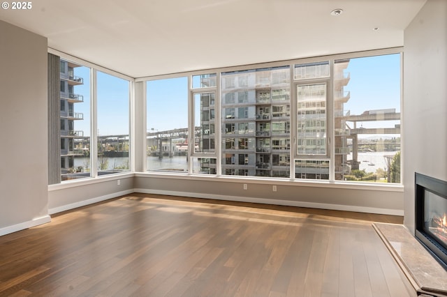 1930 S River Dr Unit W504, Portland, OR 97201 - unfurnished sunroom featuring a water view and healthy amount of natural light
