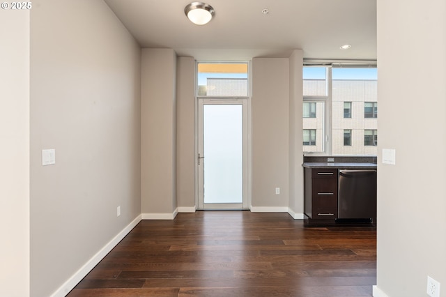 1930 S River Dr Unit W504, Portland, OR 97201 - doorway with dark wood-style flooring, baseboards, and recessed lighting