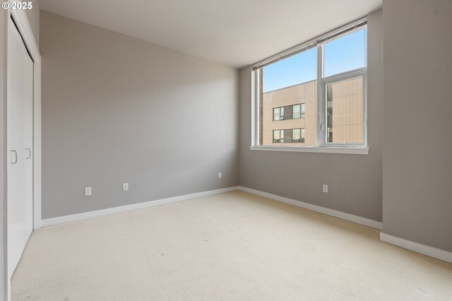 1930 S River Dr Unit W504, Portland, OR 97201 - carpeted spare room featuring baseboards