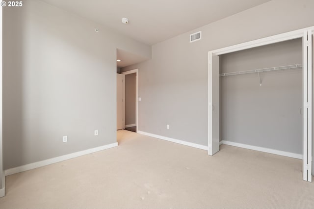 1930 S River Dr Unit W504, Portland, OR 97201 - unfurnished bedroom featuring carpet floors, a closet, and baseboards