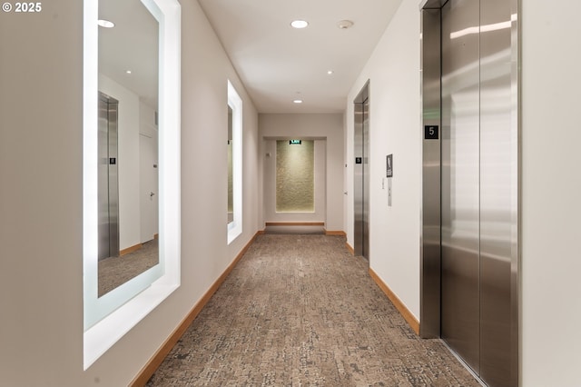 1930 S River Dr Unit W504, Portland, OR 97201 - hall with elevator, recessed lighting, and baseboards