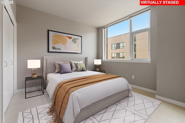 1930 S River Dr Unit W504, Portland, OR 97201 - bedroom with baseboards and light colored carpet