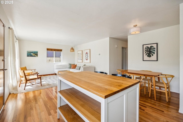 5515 SE 62nd Ave, Portland, OR 97206 - dining area featuring light wood finished floors and baseboards