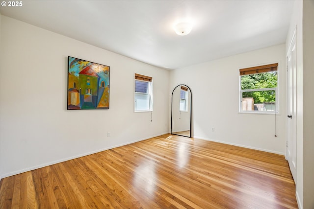 5515 SE 62nd Ave, Portland, OR 97206 - spare room featuring healthy amount of natural light, light wood-style flooring, and baseboards