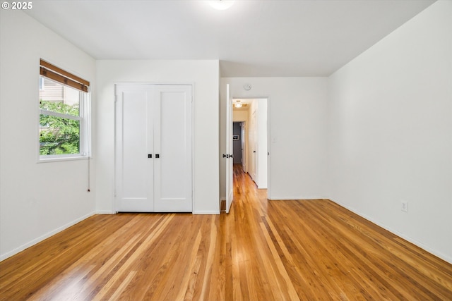 5515 SE 62nd Ave, Portland, OR 97206 - unfurnished bedroom featuring light wood-type flooring, baseboards, and a closet