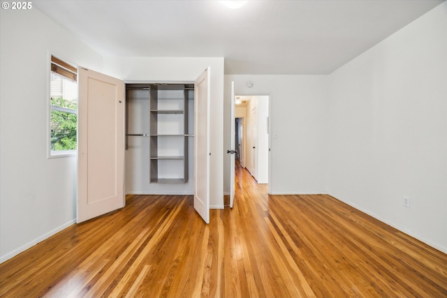 5515 SE 62nd Ave, Portland, OR 97206 - unfurnished bedroom with light wood-type flooring, baseboards, and a closet