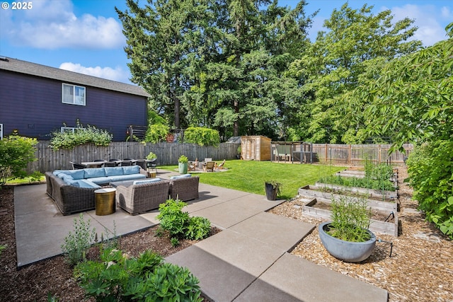 5515 SE 62nd Ave, Portland, OR 97206 - view of patio / terrace with an outdoor hangout area and a vegetable garden