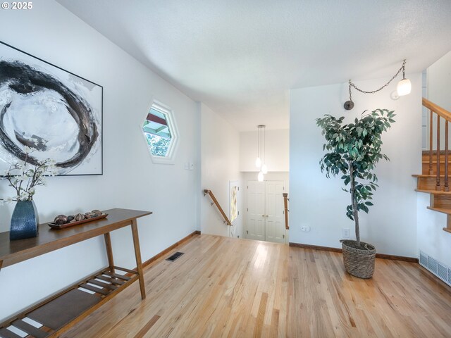 3290 Fillmore St, Eugene, OR 97405 - foyer entrance featuring wood finished floors and stairway