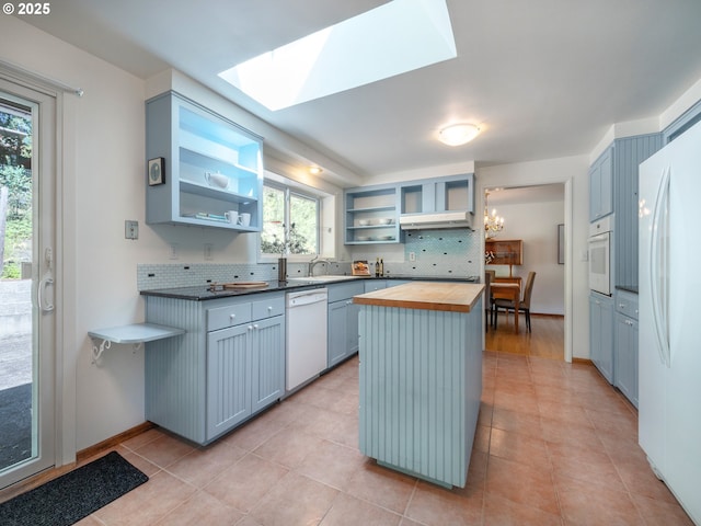 3290 Fillmore St, Eugene, OR 97405 - kitchen featuring white appliances, butcher block countertops, open shelves, decorative backsplash, and plenty of natural light