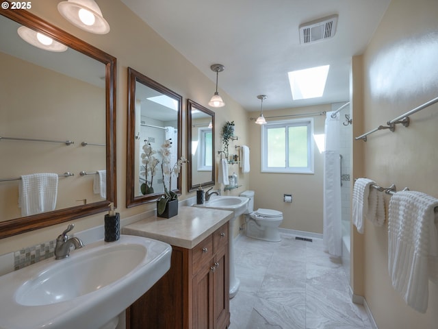 3290 Fillmore St, Eugene, OR 97405 - bathroom with a skylight, shower / tub combo with curtain, and double vanity