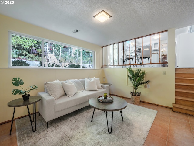 3290 Fillmore St, Eugene, OR 97405 - tiled living area featuring a textured ceiling