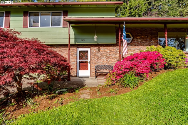 3290 Fillmore St, Eugene, OR 97405 - view of front of home with a front yard and brick siding