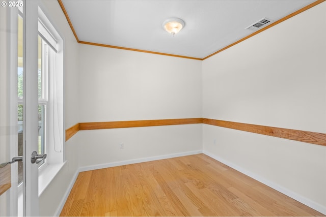 95245 N Bank Rogue River Rd, Gold Beach, OR 97444 - unfurnished room featuring crown molding and wood finished floors