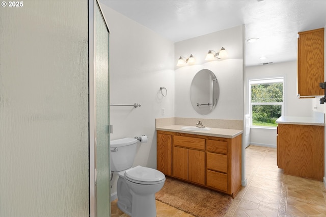 95245 N Bank Rogue River Rd, Gold Beach, OR 97444 - bathroom with vanity, a shower with shower door, and tile patterned flooring