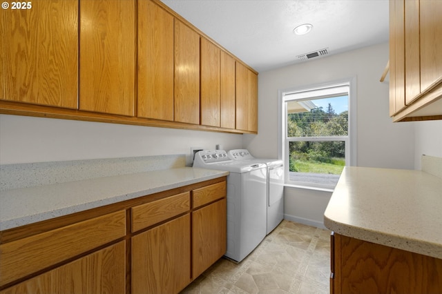 95245 N Bank Rogue River Rd, Gold Beach, OR 97444 - washroom featuring washing machine and dryer, cabinet space, and recessed lighting