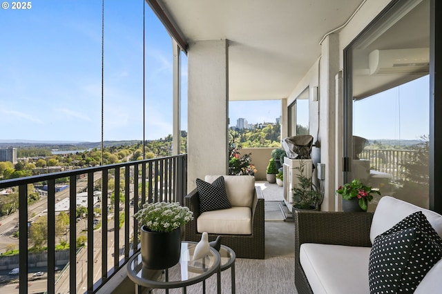 balcony featuring a wall mounted air conditioner