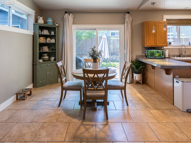 9250 SW Sagert St, Tualatin, OR 97062 - dining area featuring healthy amount of natural light