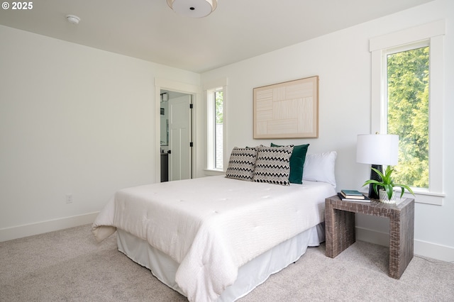 5827 NE 16th Ave, Portland, OR 97211 - bedroom featuring light carpet and baseboards