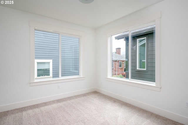 5827 NE 16th Ave, Portland, OR 97211 - carpeted spare room featuring baseboards