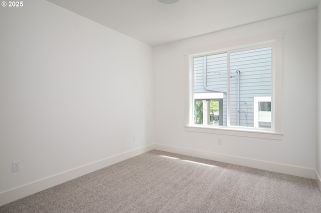 5827 NE 16th Ave, Portland, OR 97211 - carpeted empty room with baseboards